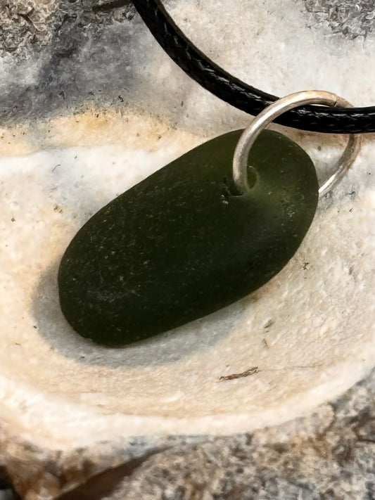 Deep green drilled pendant
